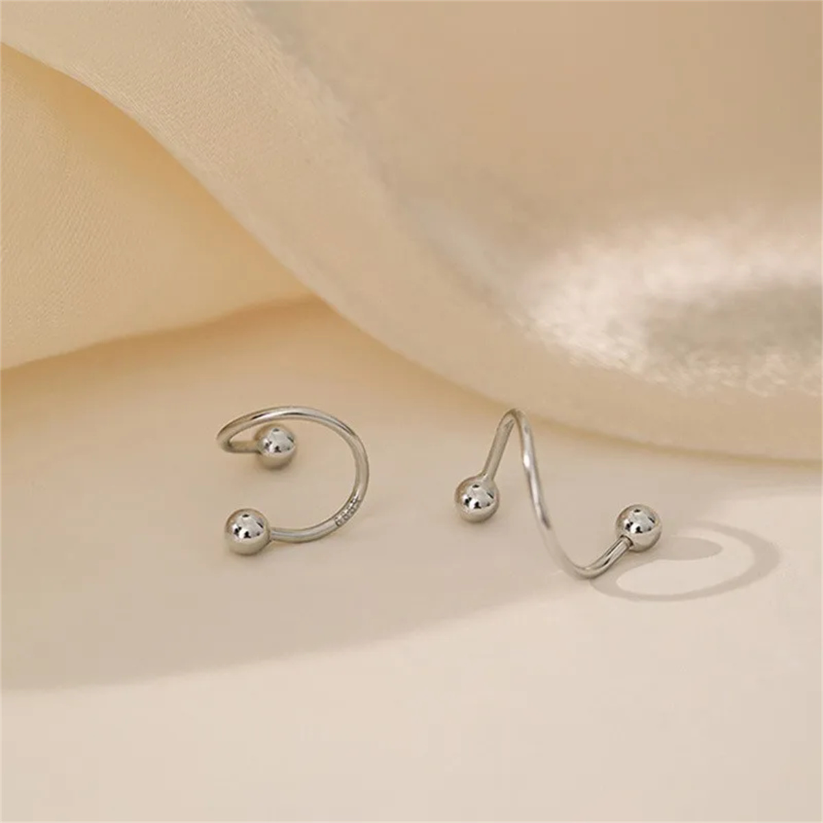 2 stuks roestvrij staal twist  - Body Jewelry Hypoallergenic recensie en prijs